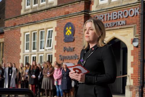 Principal Sara Russell commemorates the fallen by reading The Kohima Epitaph